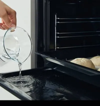 Hisense Cooker Free Standing 90x60cm 4 Gas Burners, 2 Electric Burner, Electric Oven, Glass Lid, Silver HF942GEES